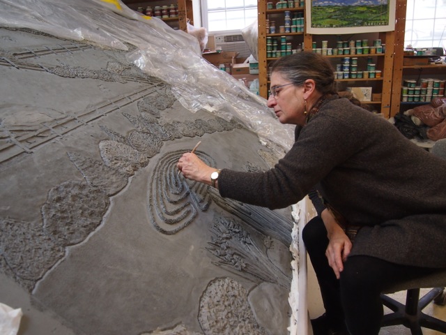 Karen adding texture to the labyrinth.